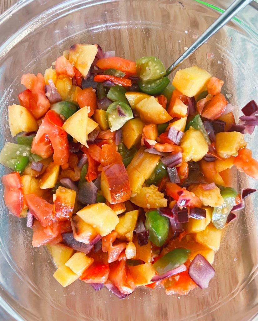 Chunky peach and tomatillo salsa features sweet peaches that pai perfectly with the tartness of the tomatillos.